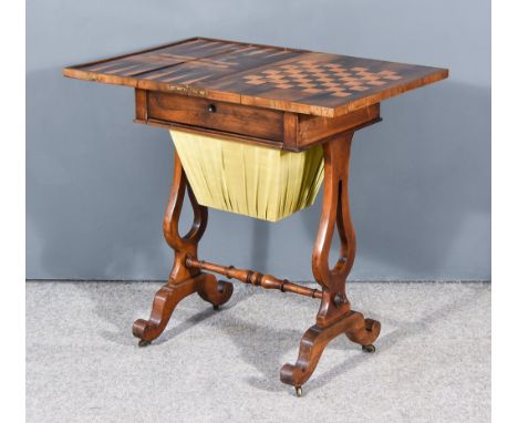 An Early Victorian Rosewood Rectangular Work/Games Table, the top opening to reveal chess board, backgammon board and cribbag