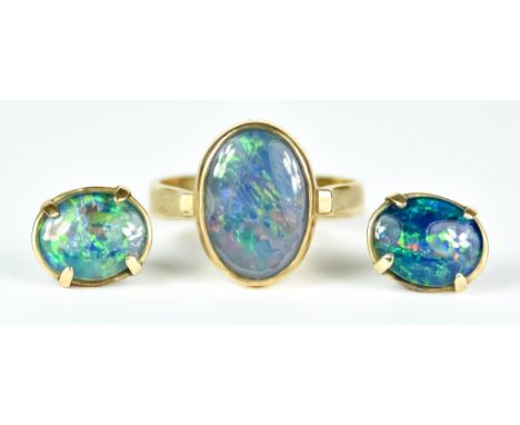 A 9ct Gold Opal Ring with Earrings, 20th Century, opal ring set with centre cabochon opal,  size P, with matching earrings fo