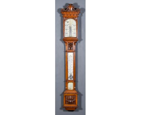 A Late Victorian Oak Cased Stick Barometer and Thermometer, by J.H Steward Ltd, 406 Strand, London, with white opaque glass s