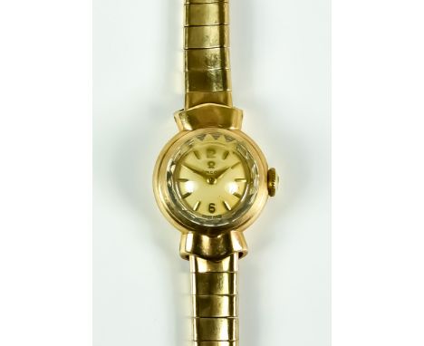 A 9ct Gold Lady's Manual Wind Wristwatch by Omega, champagne dial, 18mm diameter, with gold baton numerals, integral bracelet