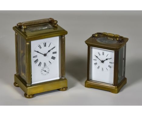 An Early 20th Century French Carriage Timepiece with Alarum and One Other Carriage Timepiece, the larger with white enamel di