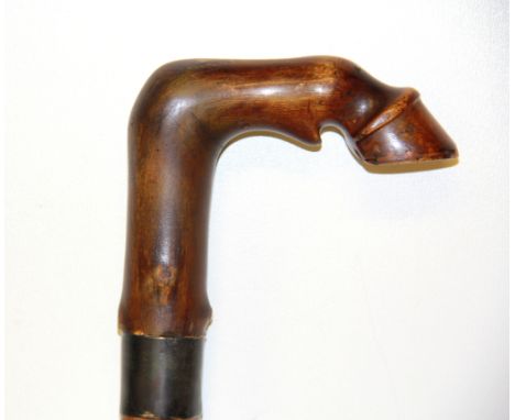 An unusual early swordstick with carved horn horses hoof handle, L. 89cm.