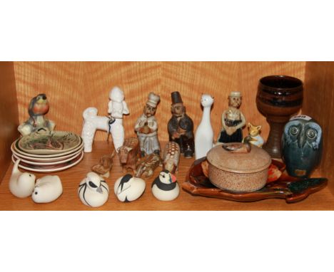 A group of mixed ceramic animals and other items.