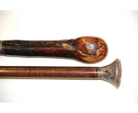 A hallmarked silver topped walking cane and a silver banded sword&nbsp;stick, longest L. 93cm.