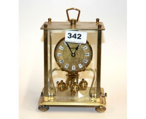 A gilt four glass mantle clock, H. approximately 15cm.