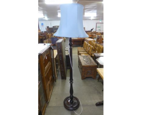 A mahogany standard lamp 