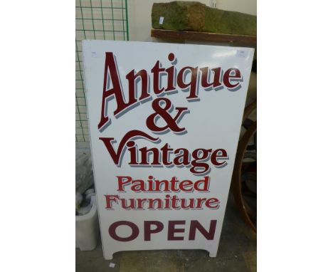 A double sided Antique &amp; Vintage Furniture shop sign 