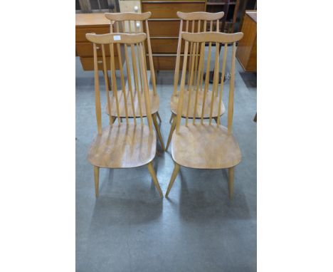 A set of four Ercol Blonde elm and beech Goldsmith chairs 