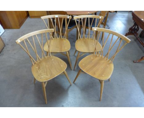 A set of four Ercol Blonde elm and beech 376 model candlestick chairs 