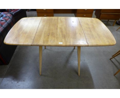 An Ercol Blonde elm and beech Windsor drop-leaf table 