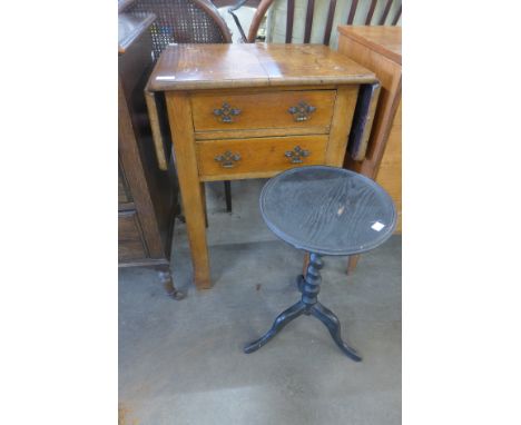 A Victorian oak two drawer drop-leaf side table and an oak barleytwist tripod wine table 