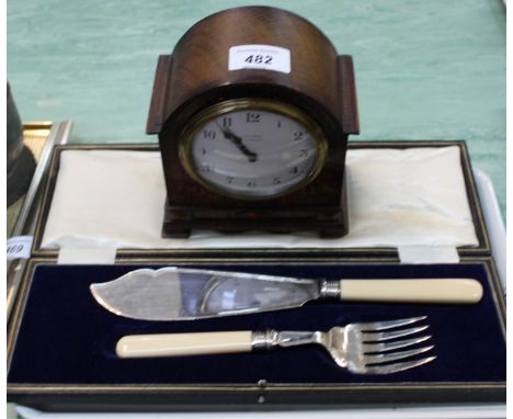 An oak mantel clock plus cased cake servers