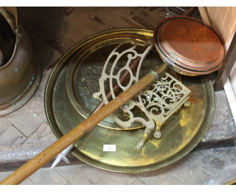 Two brass trays, shooting stick, trivets plus a Victorian copper warming pan