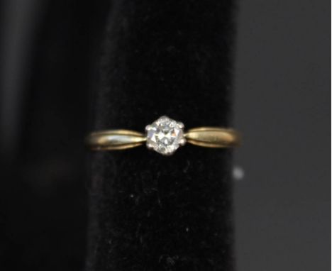 An 18ct gold solitaire diamond ring, size L