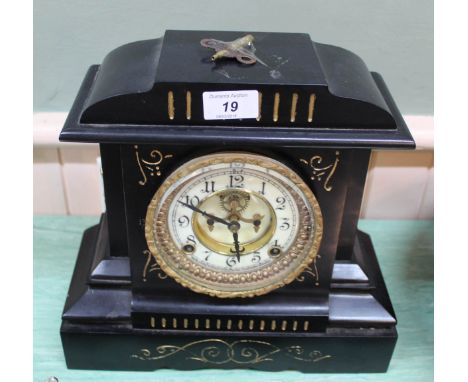 A metal cased ansonia mantel clock