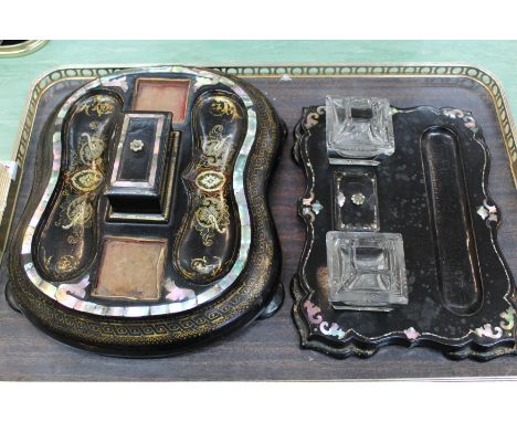 A Victorian mother of pearl inlaid papier mache two bottle inkstand plus one other (no bottles)