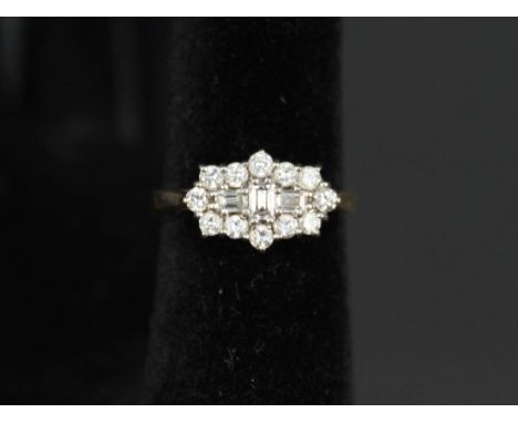 A very attractive 18ct gold diamond cluster ring in the Art Deco style set with baguette and brilliant cut diamonds, estimate