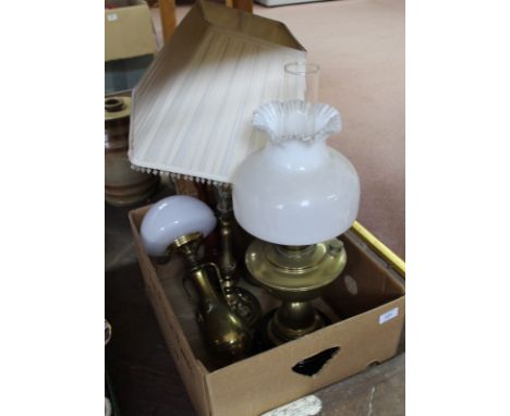 A brass oil lamp plus four table lamps