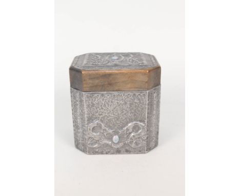 An Arts and Crafts pewter bound wooden tea caddy with raised dragon decoration inset with Ruskin style roundels, 4 3/4" wide