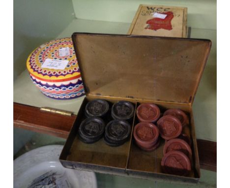 A Victorian set of English Draughts playing pieces with crown decoration, harlequin Staunton chess set, etc.