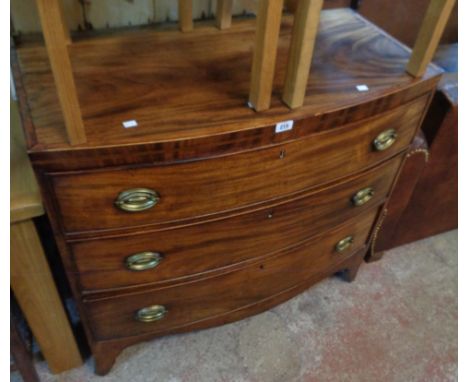 A 3' 2 3/4" 19th Century mahogany and strung bow front chest of three long graduated drawers, set on raised bracket feet