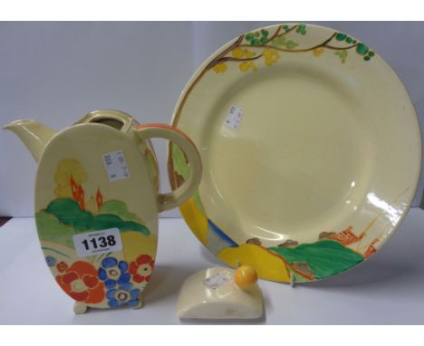 A Clarice Cliff Bizarre Alton pattern ovoid coffee pot with associated lid, and a Secrets pattern oval plate