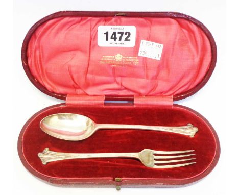 A cased Alexander Clark dessert spoon and fork set
