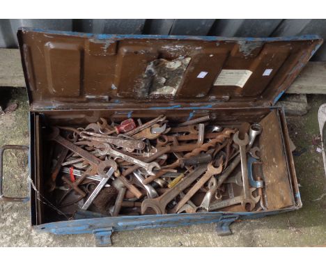 An ammo box containing spanners and other tools