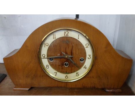 A mid 20th Century polished walnut cased Bentima mantel clock with floating escapement and eight day Westminster chiming move
