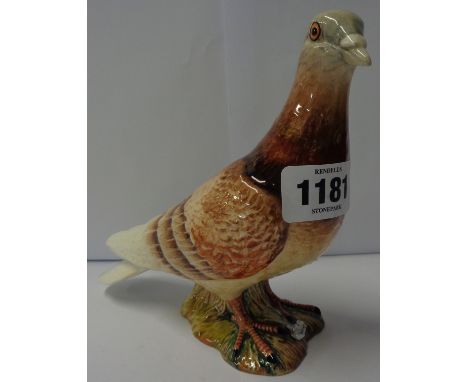 A late 1950's Beswick first type red pigeon with three stripes to wings and ring to left leg, 1383/1b