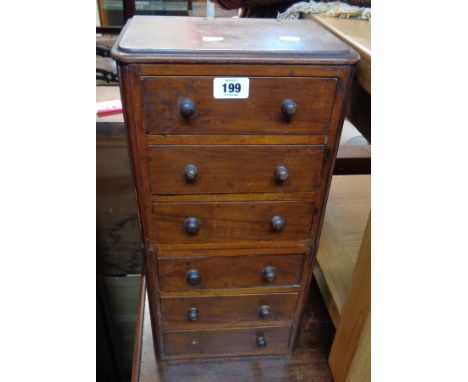 A flight of six small drawers - constructed from two Victorian dressing table trinket drawer sections