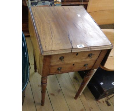 A 15 1/2" 19th Century mahogany drop-leaf work table with two short drawers and opposing dummy drawer fronts, set on slender 