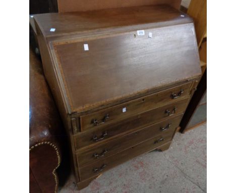 A 30" Edwardian mahogany and strung bureau with fitted interior and three long graduated drawers under, set on bracket feet