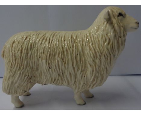 A boxed early 21st Century Beswick Rare Breeds Cotswold sheep 4122