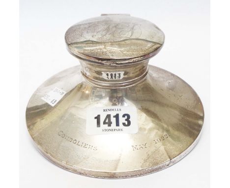A 6" diameter silver capstan inkwell with hinged flip-top bearing initials, associated liner and inscription "Gondoliers May 