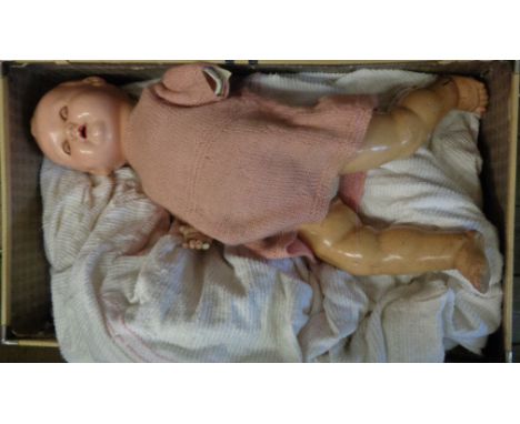 A 20th Century bisque headed doll marked 264K8 - arm broken off