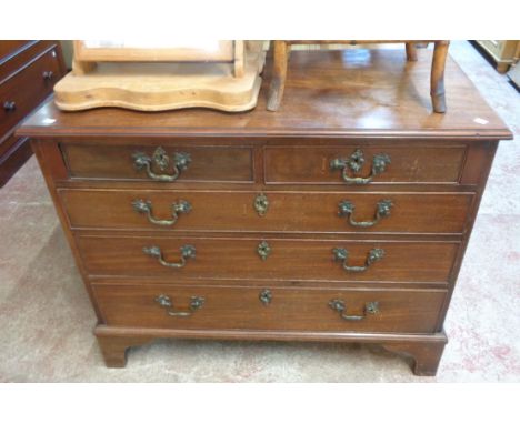 A 3' 4 1/4" 19th Century mahogany and oak lined chest of two short and three long graduated drawers, set on bracket feet
