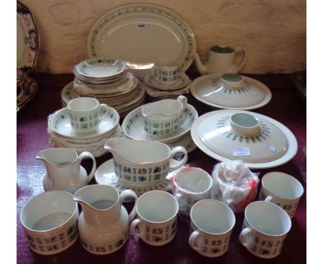 A Royal Doulton Tapestry pattern tea and dinner service including two tureens, meat plate, gravy boat, teapot, etc.