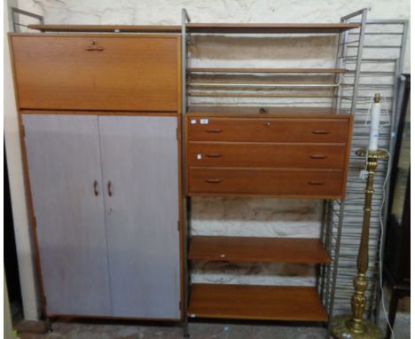A vintage Staples Ladderax wall unit consisting of a later part painted wardrobe with retaining hooks, fall-front record stor