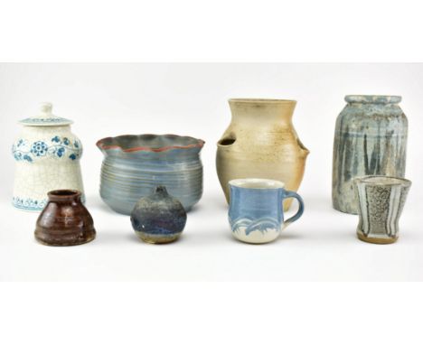 A collection of vintage 20th century studio pottery ceramics. The lot to comprise a blue salt-glazed pot with flared rim, a S