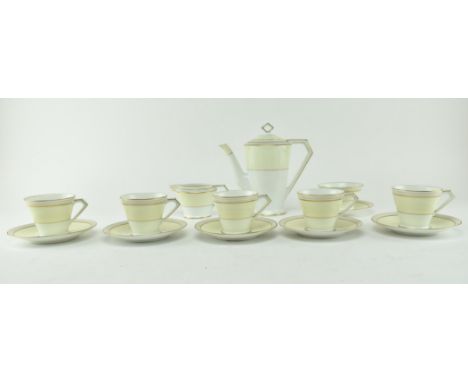 Noritake - a vintage mid 20th century tea service of Art Deco style. The service of cream yellow &amp; white ground with gilt