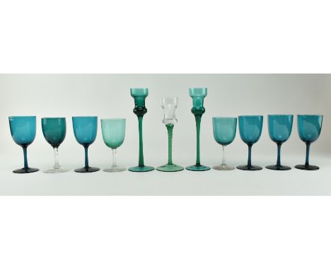 A collection of early 20th century teal coloured drinking glasses &amp; candlestick holders. The lot to include two matched c