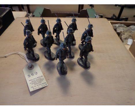 10 Elastolin German Army figures. 10 marching with rifles shouldered. GC for age, minor cracking. 