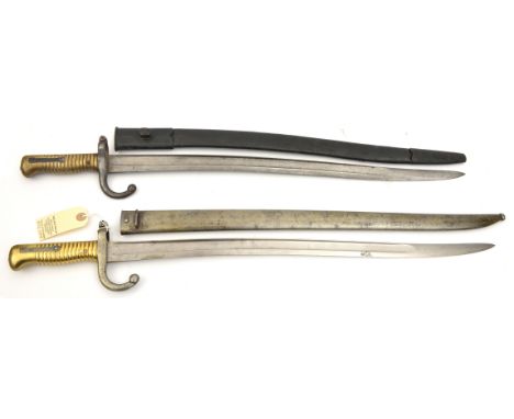 A French 1866 Chassepot bayonet, dated Chatellerault 1869, in its steel scabbard (non matching numbers), GC; and another, dat