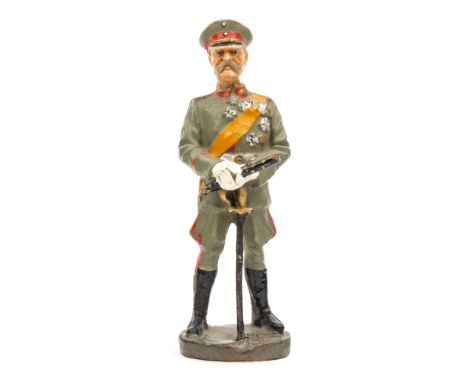 A rare Elastolin figure of Hindenburg. With porcelain head, in full Field Marshall uniform, light greyish green with orange s