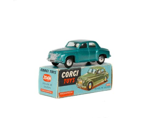 Corgi Toys Rover 90 Saloon (204M). An example in metallic green with smooth wheels and black rubber tyres. Mechanical motor i