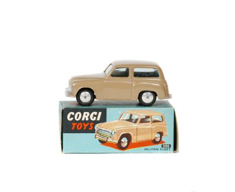 Corgi Toys Hillman Husky (206). An example in light brown with smooth wheels and black rubber tyres. Boxed, early all blue ex