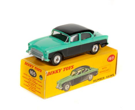 Dinky Toys Humber Hawk (165). An example in mid green with black roof and lower sides, spun wheels with black treaded tyres. 