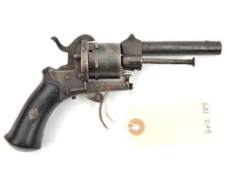 A Belgian 6 shot 7mm DA pinfire revolver, 7” overall, round barrel 3¼”, Liege proved, with folding trigger and dark (rosewood