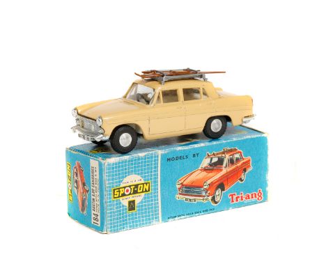 Tri-ang Spot-On 1:42 scale Austin A60 Cambridge (184). An example in light tan with roof rack and skis. Boxed, minor wear. Ve